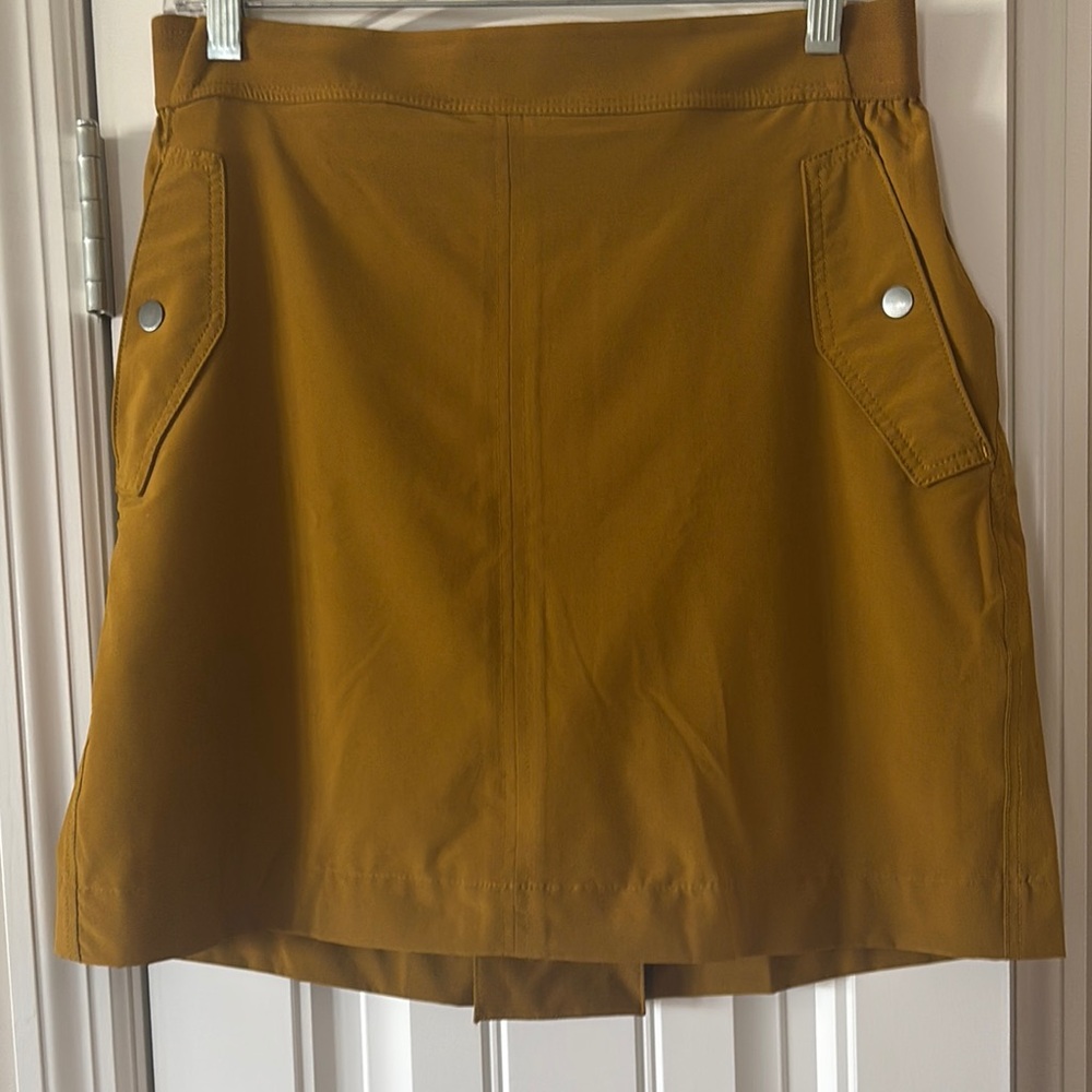 Athleta golf skort in deep gold. Size 10